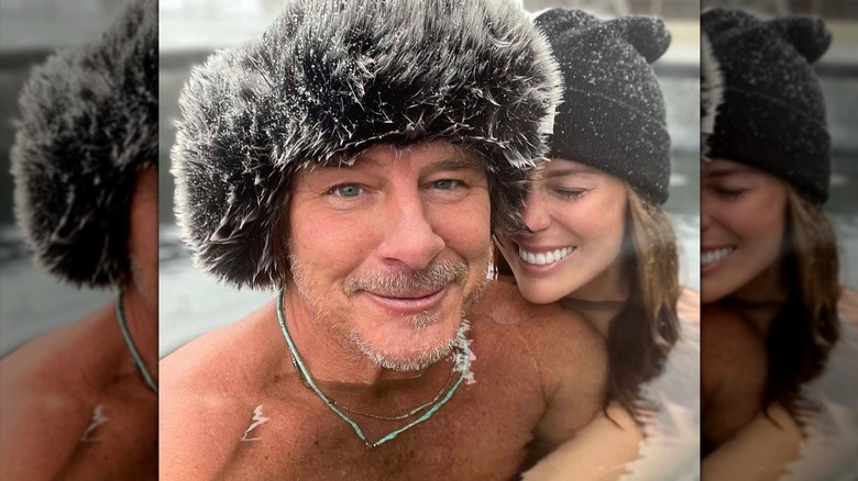 Ty Pennington and Kellee Merrell taking a selfie in the hot tub.