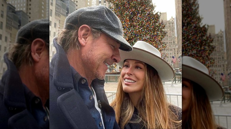 Ty Pennington and Kellee Merrell in front of the Rockefeller Christmas tree.