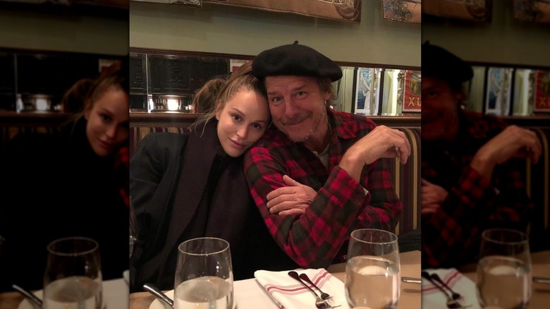 Ty Pennington and wife Kellee Merrell sitting in a restaurant.