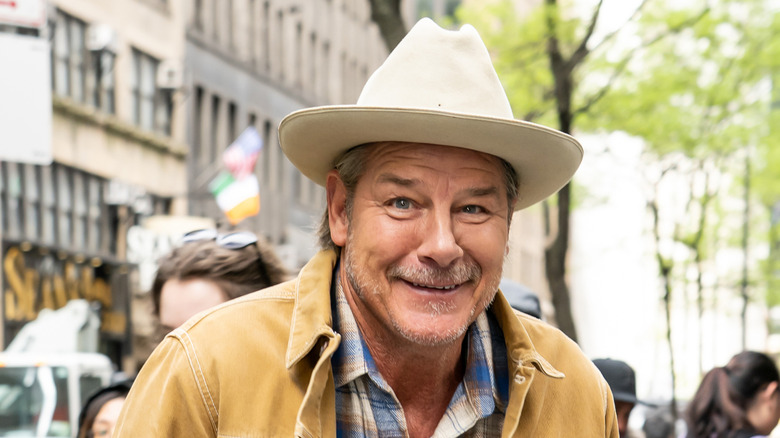 Ty Pennington wearing hat and smiling