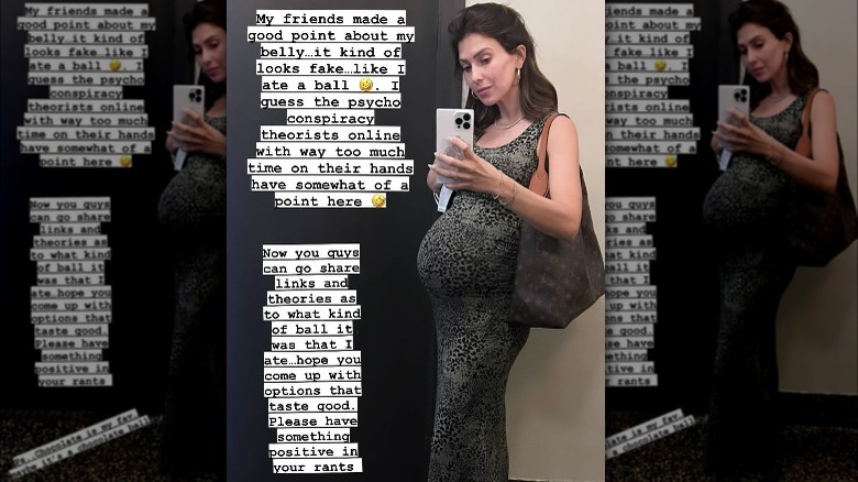 Hilaria Baldwin taking a full-body mirror selfie with her baby bump