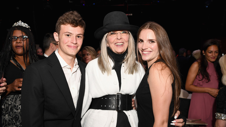 Diane Keaton smiling while posing with her kids Dexter and Duke