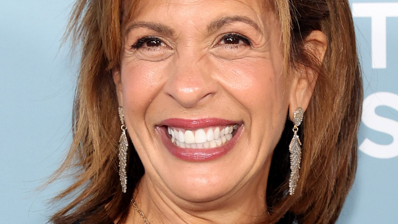 Hoda Kotb wearing dangling earrings