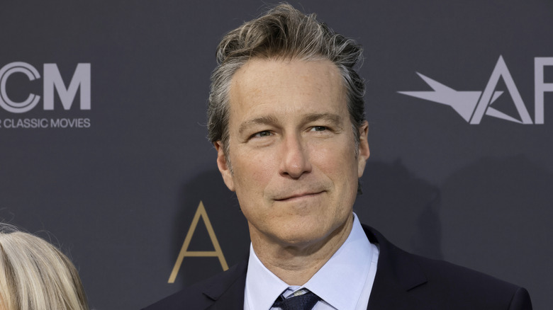 John Corbett smirking