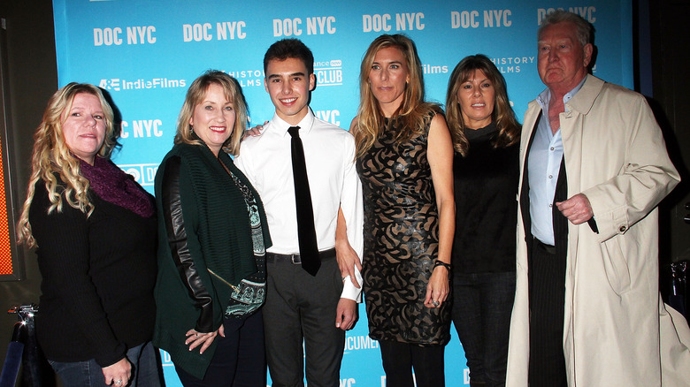 "An Open Secret" filmmakers posing 