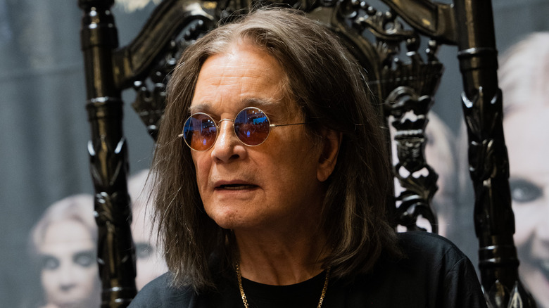 Ozzy Osbourne sitting down