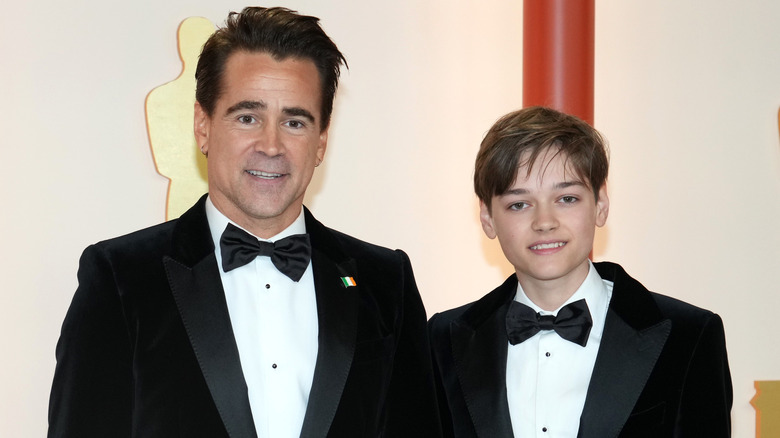 Colin Farrell posing with his son at the Oscars
