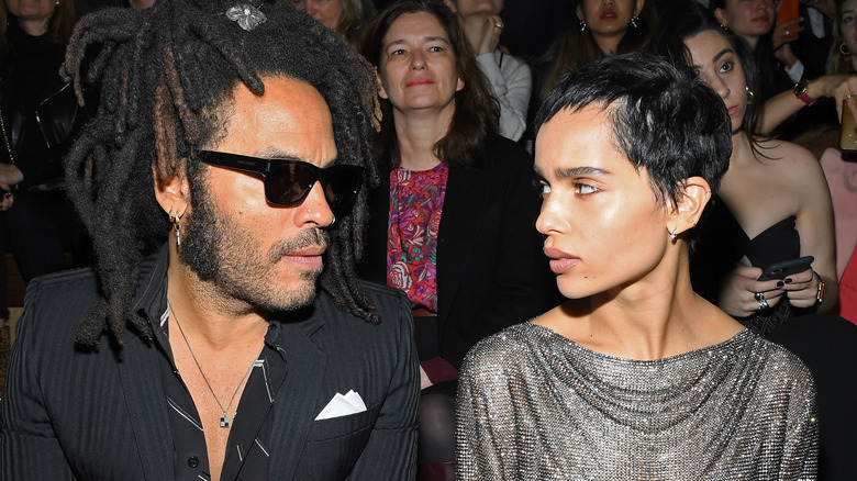 Lenny Kravitz and Zoe Kravitz looking at each other