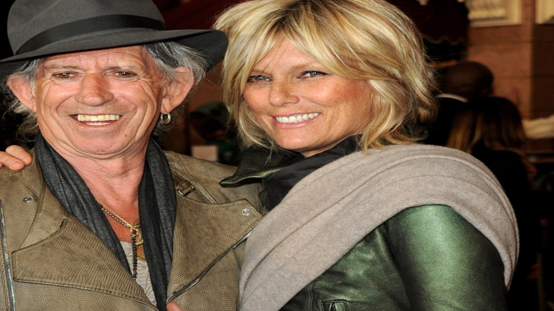 Keith Richards and his wife Patti Hansen, both smiling