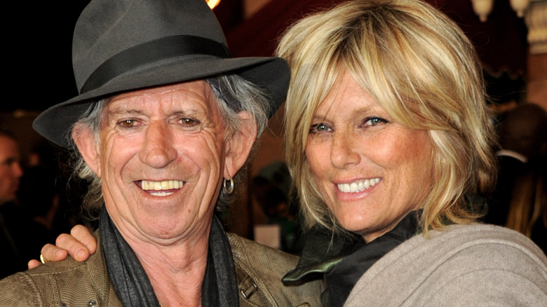 Keith Richards and his wife Patti Hansen, both smiling