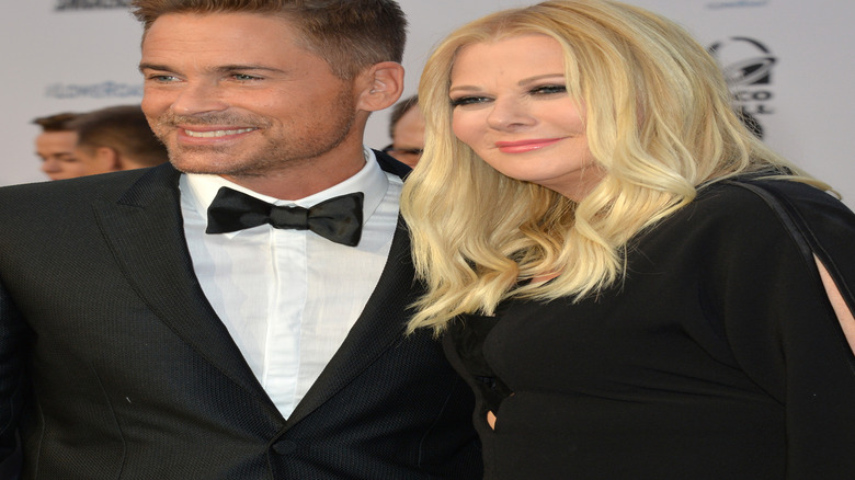 Rob Lowe and his wife Sheryl Berkoff posing and smiling together