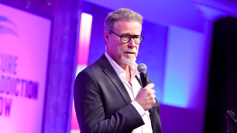 Dean McDermott speaks on-stage during a 2025 fundraiser