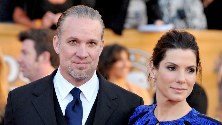 Jesse James poses with then-wife Sandra Bullock in 2010