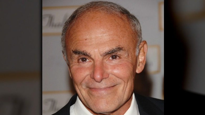 John Saxon smiling