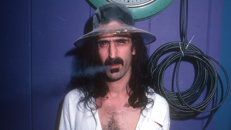 Frank Zappa blowing smoke