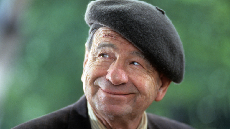 Walter Matthau smiling in a beret