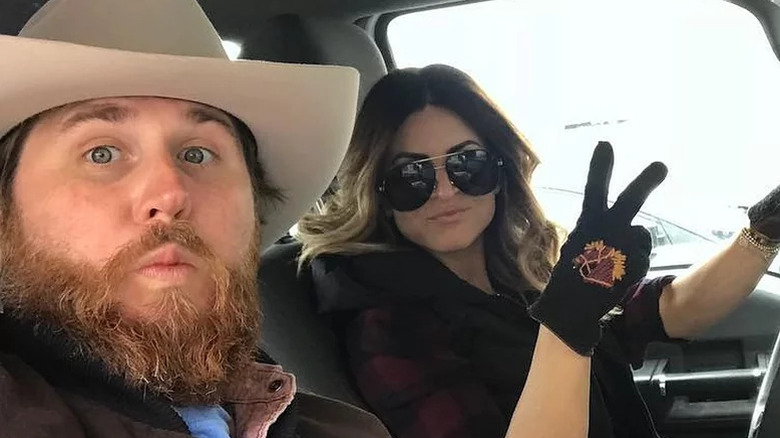 Donovan Eckhardt and Alison Victoria in a vehicle