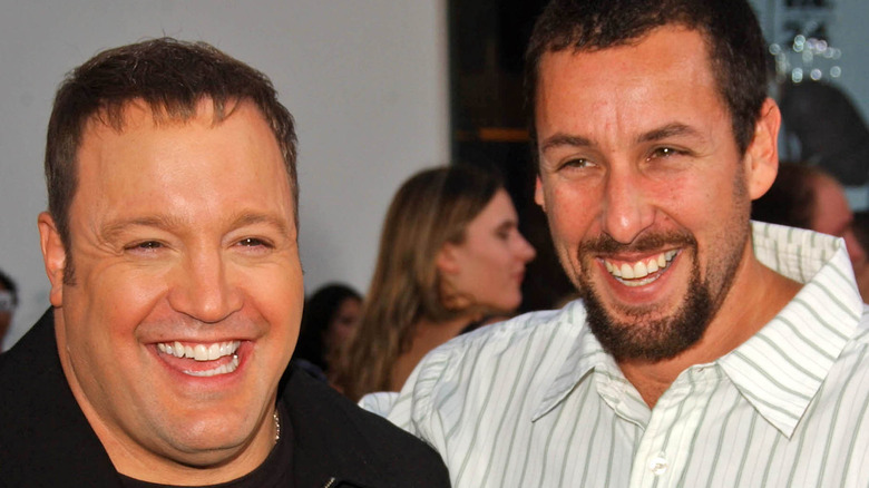 Kevin James and Adam Sandler smiling