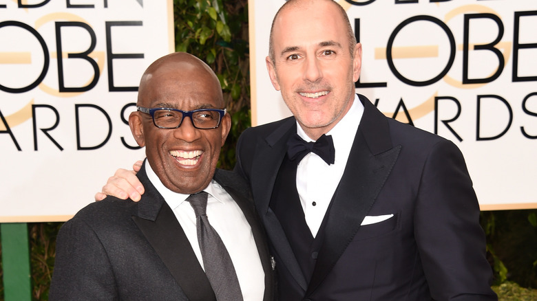 Al Roker and Matt Lauer smile on the red carpet