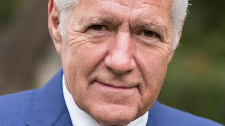 Alex Trebek outside not smiling