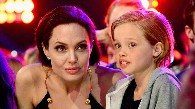 Angelina Jolie staring Shiloh Jolie-Pitt looking scared