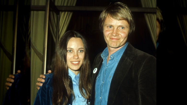Marcheline Bertrand and Jon Voight pose together in the 70s.