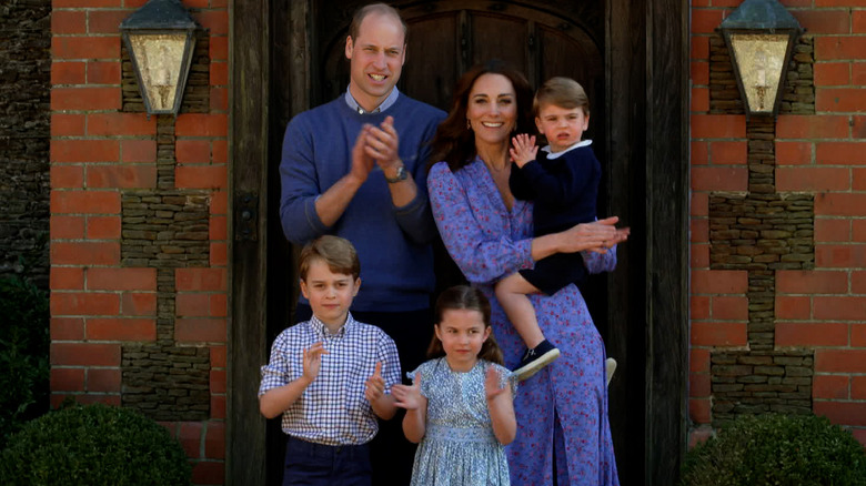 Prince William, Kate Middleton, Prince George, Princess Charlotte, and Prince Louis clapping