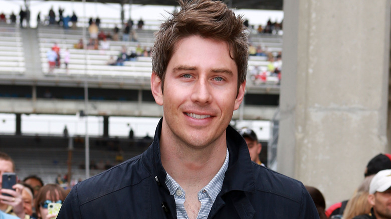 Arie Luyendyk Jr. smiling at race track