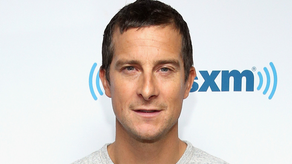 Bear Grylls smiling slightly 