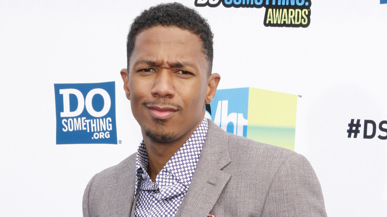 Nick Cannon poses 