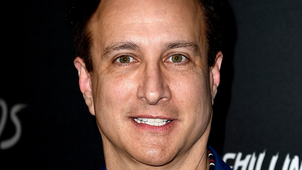 Bronson Pinchot, 2018 red carpet, brown hair, smiling, no facial hair, in a suit