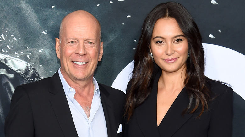 Bruce Willis and Emma Heming smiling