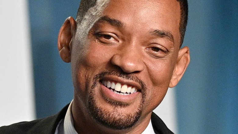 Will Smith cries on stage at the Oscars