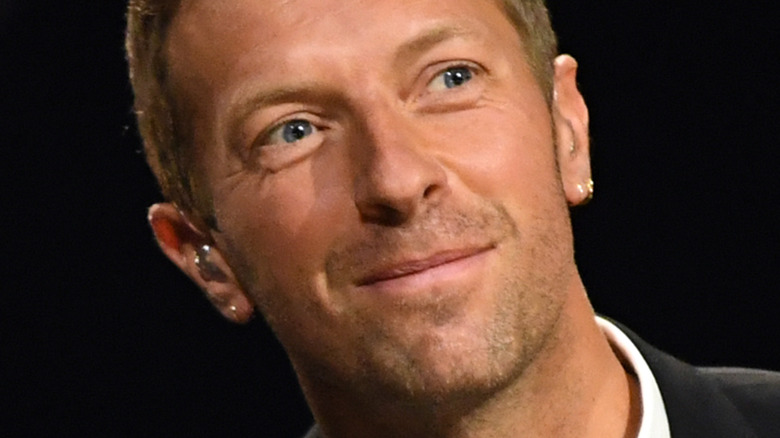 Chris Martin performs on stage