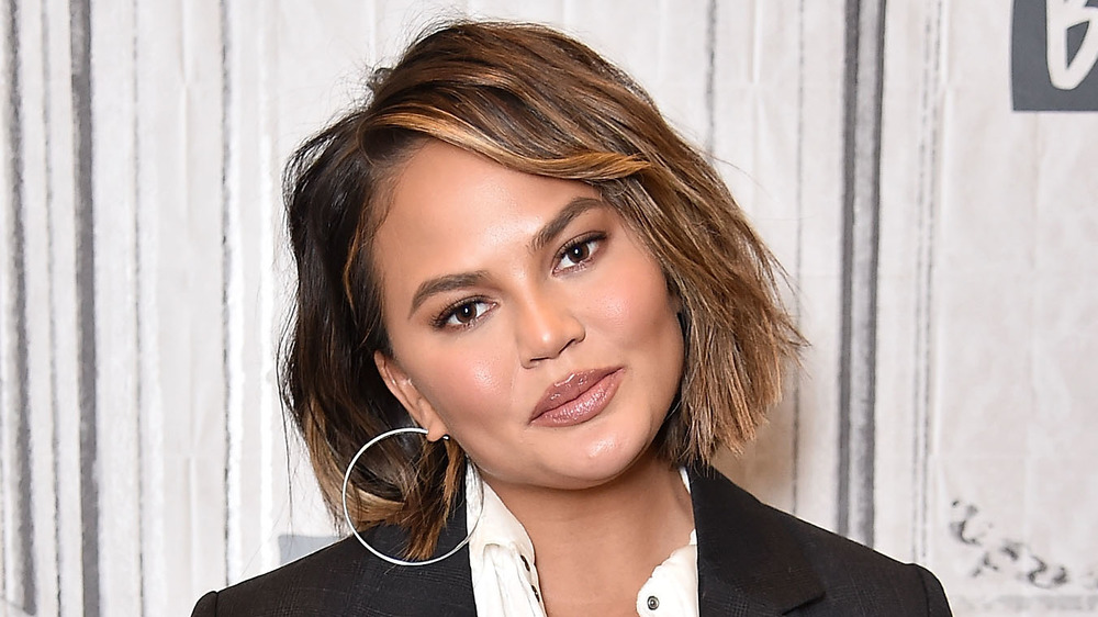 Chrissy Teigen poses