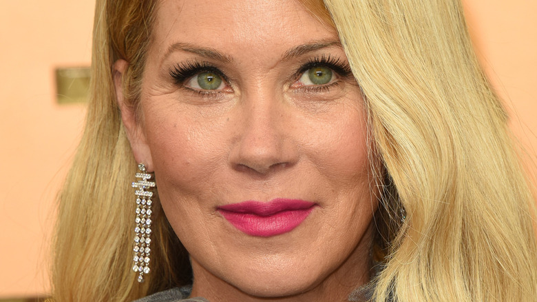 Christina Applegate wearing diamond earrings