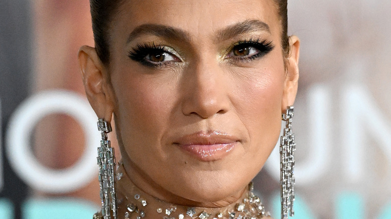 Jennifer Lopez wearing chandelier earrings