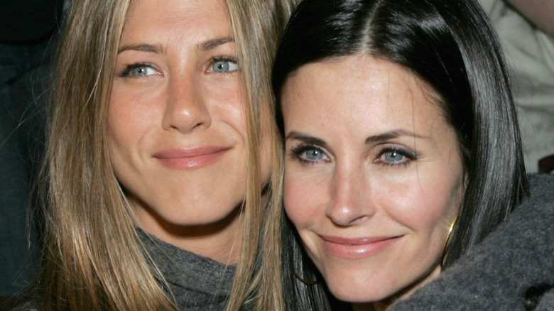 Jennifer Aniston and Courteney Cox hugging