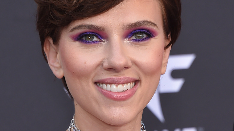 Scarlett Johansson smiling purple eye makeup