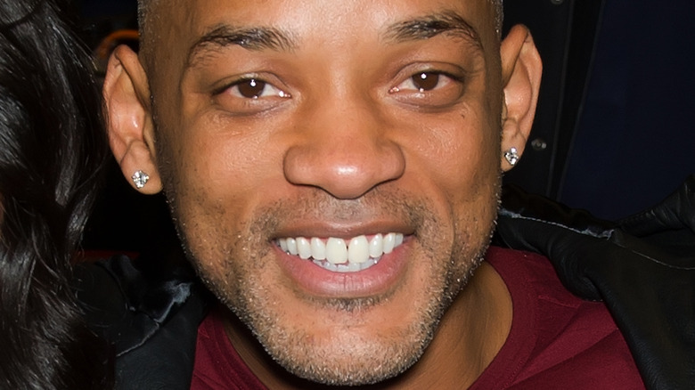 Will Smith and Jada Pinkett Smith wear stud earrings