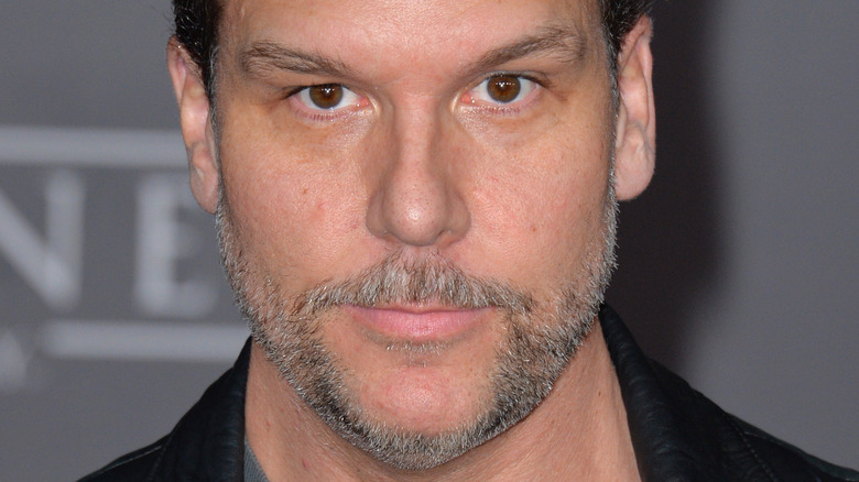 Dane Cook poses in a leather jacket in 2016