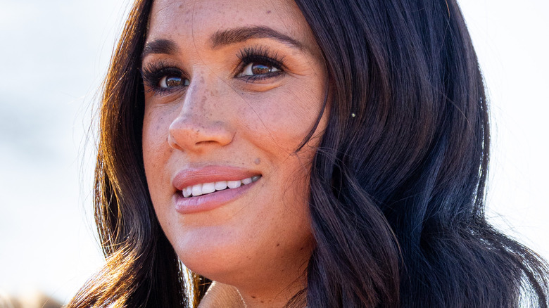 Meghan Markle looking intently