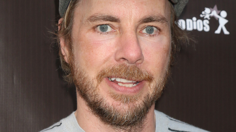 Dax Shepard smiling on red carpet