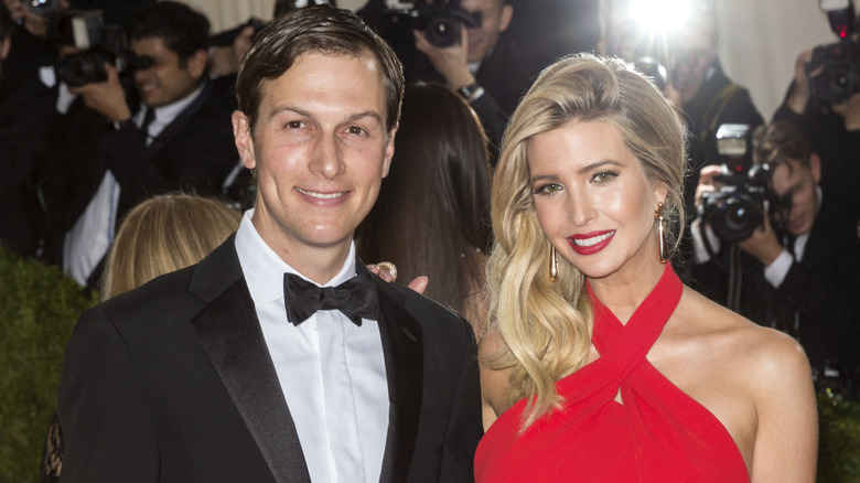 Jared Kushner posing with Ivanka Trump