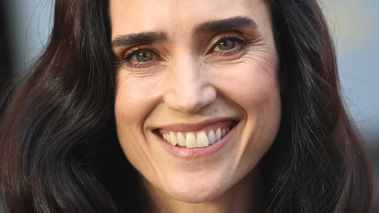 Jennifer Connelly long brown hair smiling