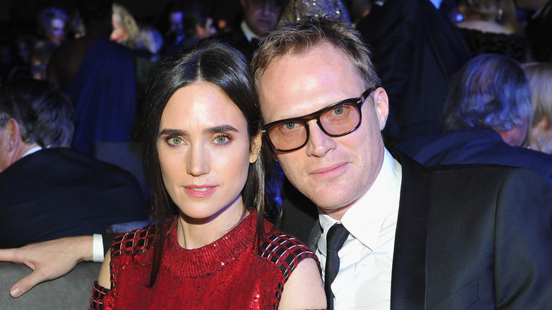 Jennifer Connelly red dress smiling Paul Bettany black glasses