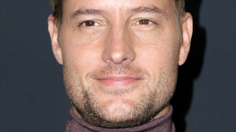 Justin Hartley posing at an event