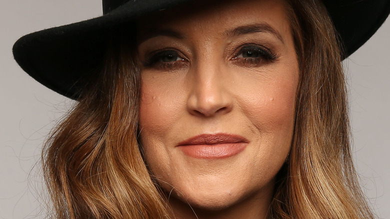 Lisa Marie Presley wearing black hat