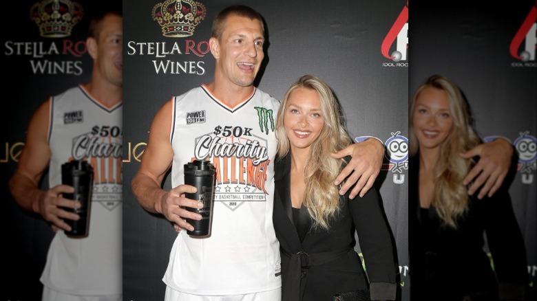 Rob Gronkowski and Camille Kostek on a red carpet