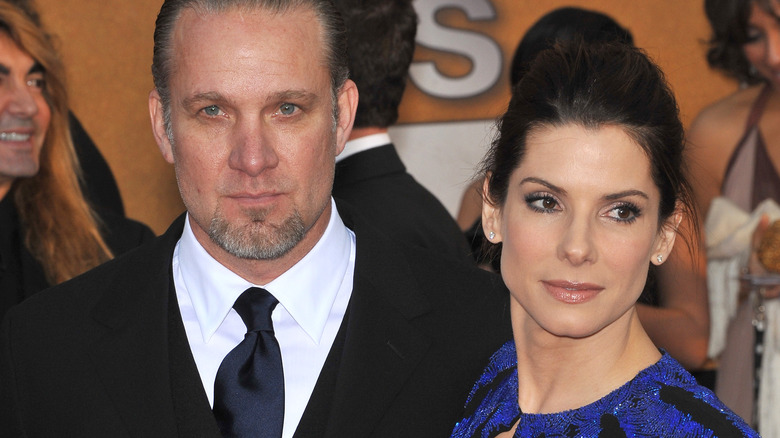 Jesse James and Sandra Bullock posing together